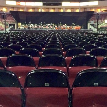 View of the stage from the back row of floor seating.